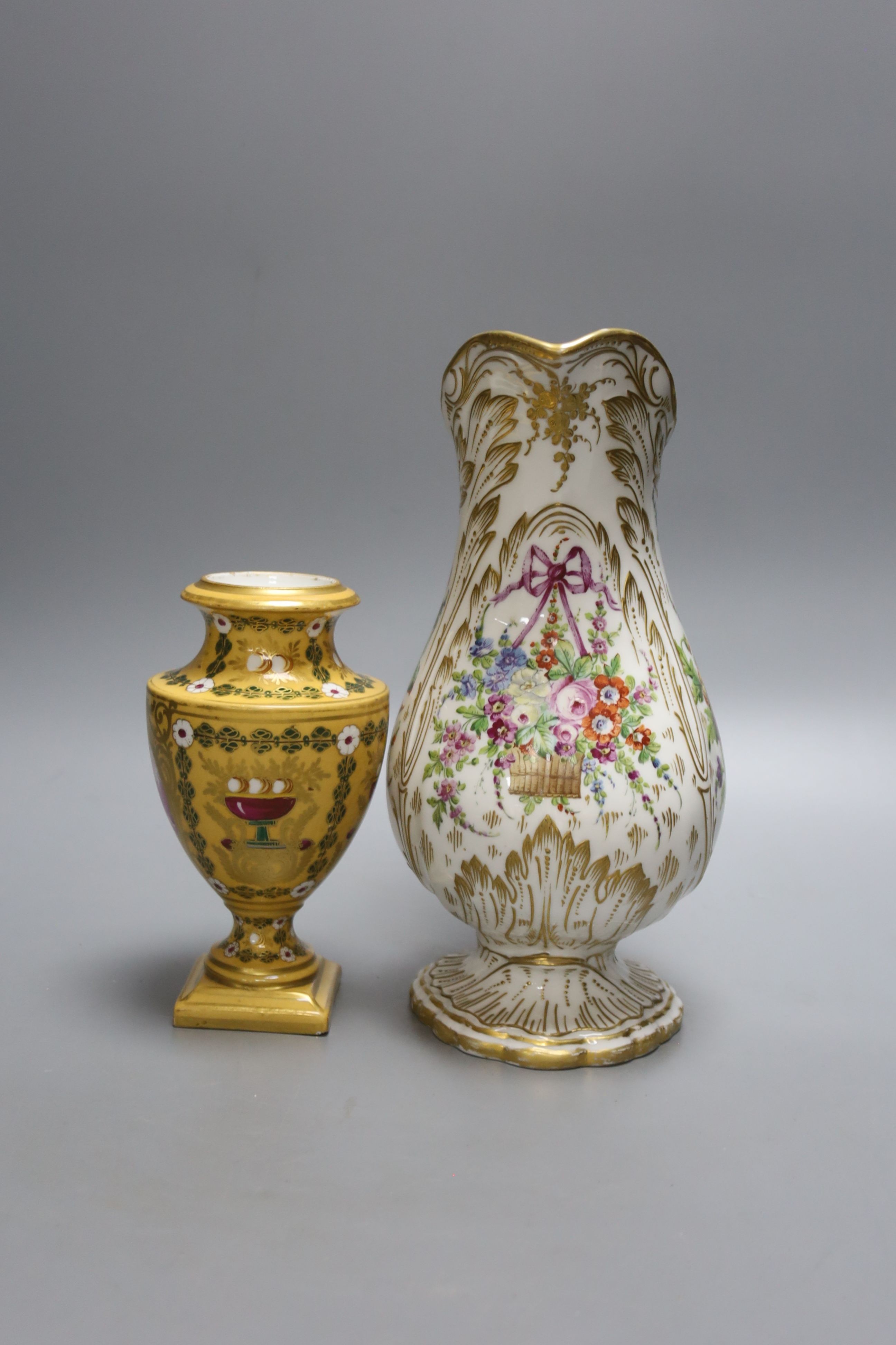 A 19th century Sevres floral and gilt painted jug and vase, tallest 24cm